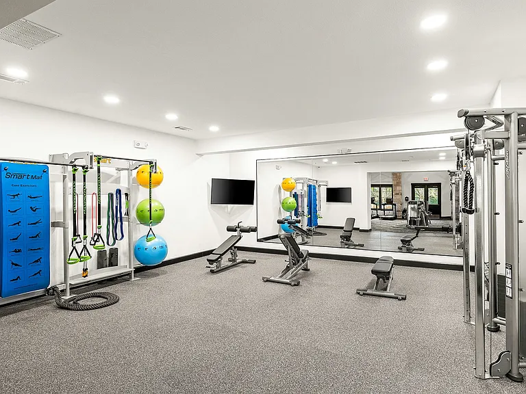 Cardio and Strength Training Fitness Center with Stretching Area