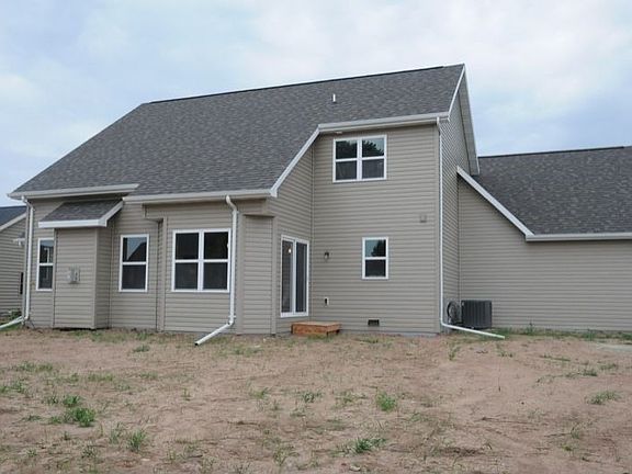 Back (picture of similar home)