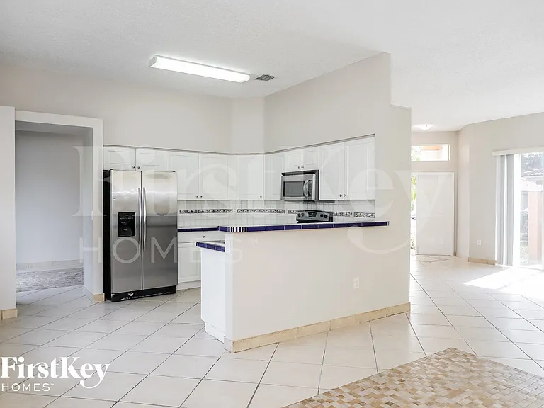 9064 SW 214th St — Photo 3
