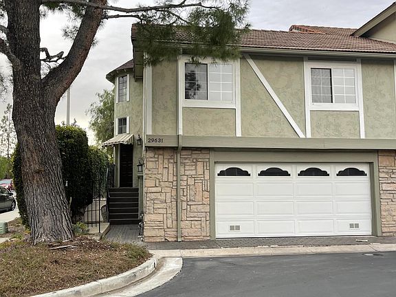 garage is attached but does not have direct access to the townhouse