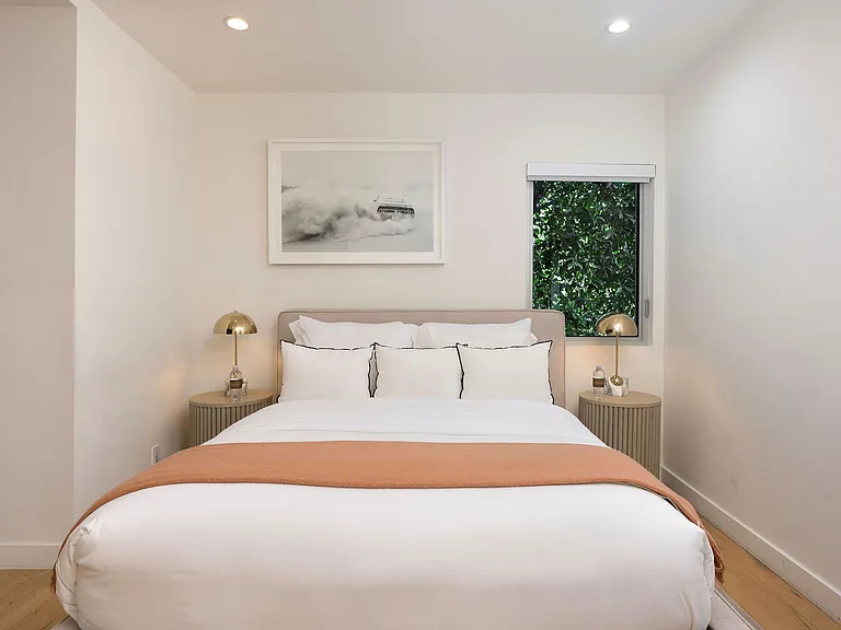 Guest bedroom #2 with a queen size bed, Smart TV and jack and hill bathroom.