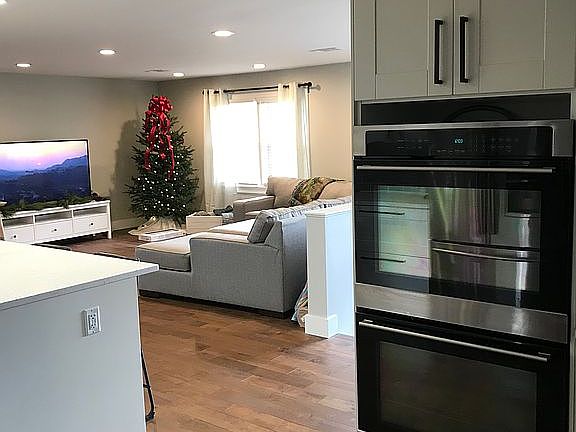 Double oven and living room 