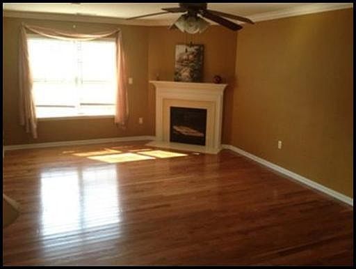 Family room: hardwood and fireplace