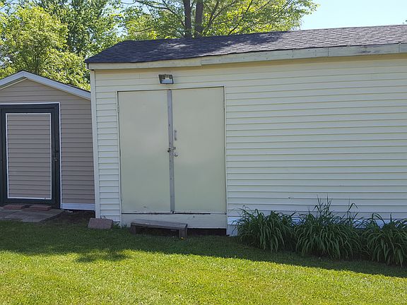 two sheds with electrical