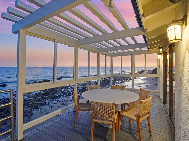 Savor al fresco dining with breathtaking ocean and mountain views.