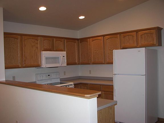 Upgraded kitchen includes all appliances.