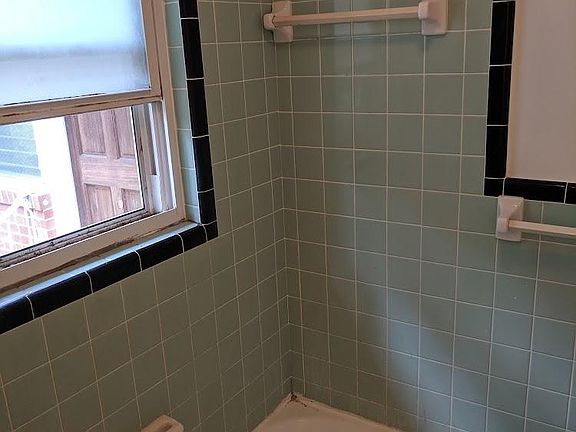 Bathroom, tub and shower