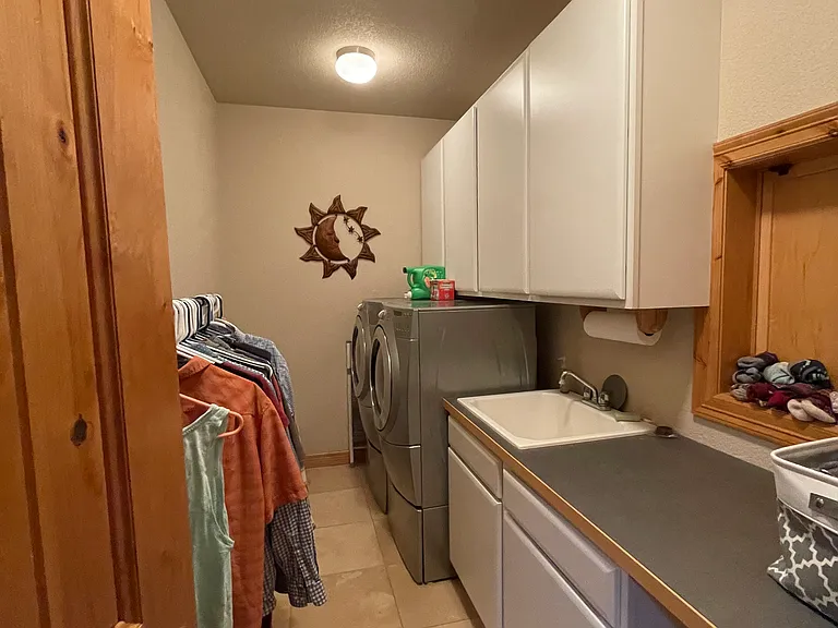 Well organized laundry room on the main floor.