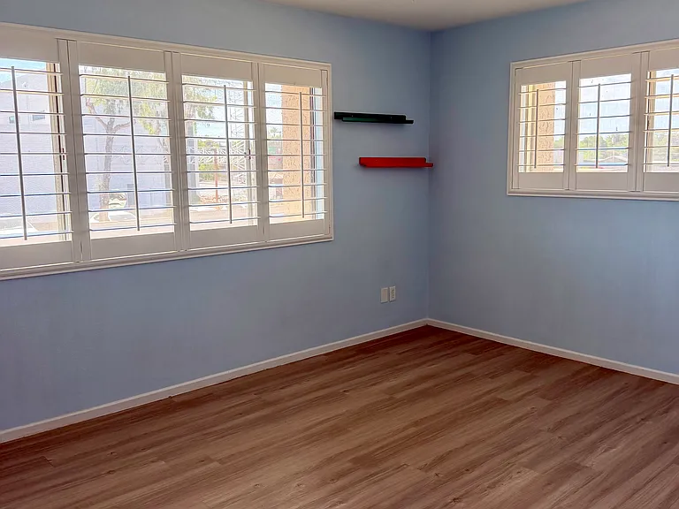 Shutters throughout and ceiling fans throughout