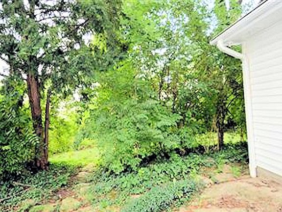 .21 acre lot w/ mature trees