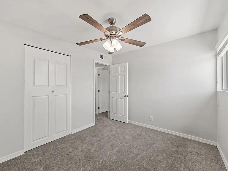 Roomy closet and a bright layout make bedroom three a versatile space.