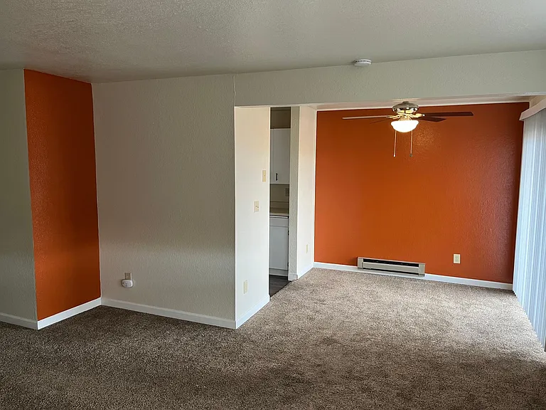 Dining Area with ceiling fan. Access to balcony