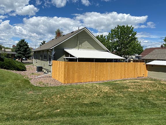 Fenced Privacy back patio with cover.