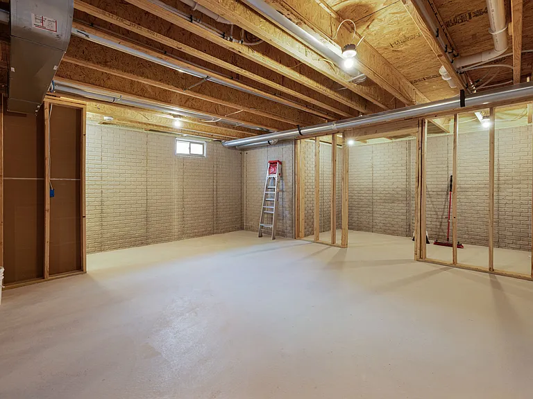 Basement - Finishing touches still in progress! Great additional storage throughout.
