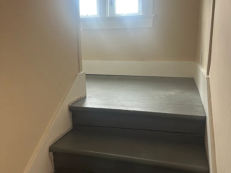 Stairway off bedroom up to walk in closet