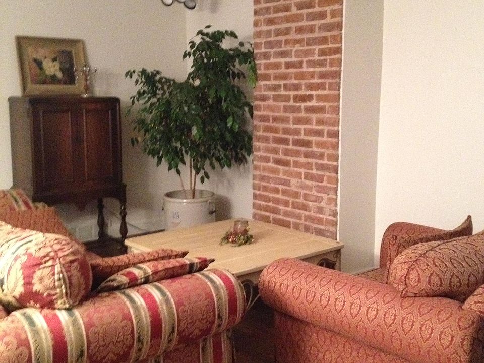 cozy living room, exposed brick