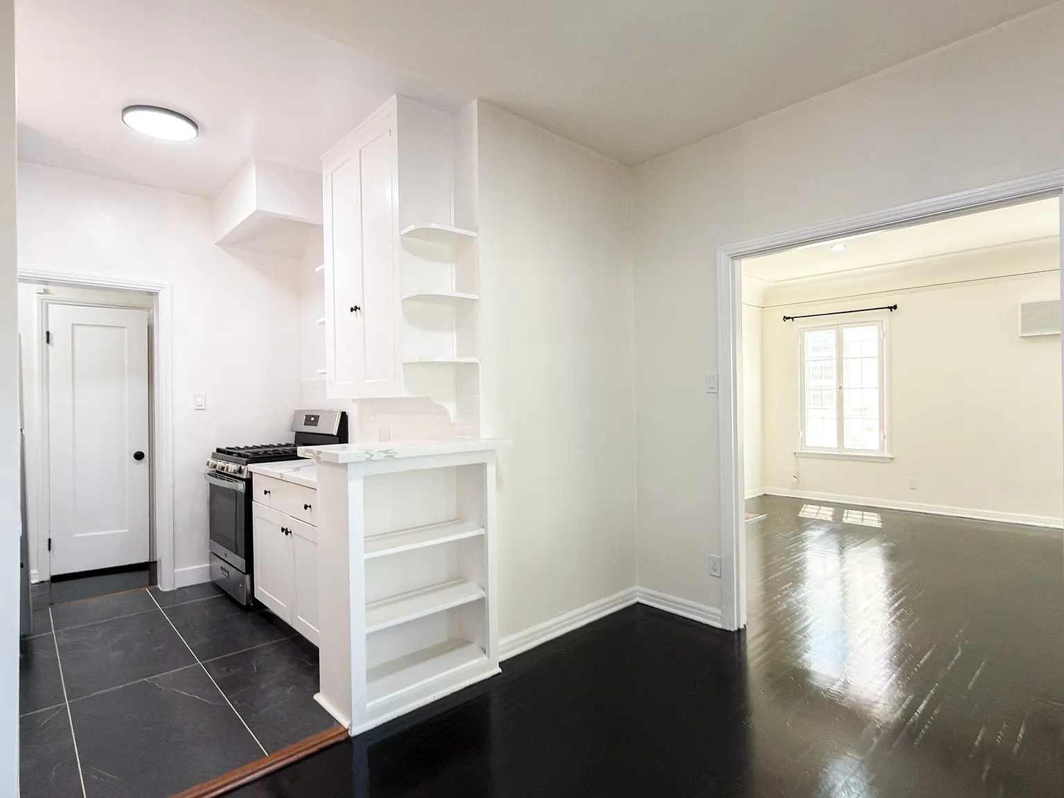 Just Updated 1,100 Sq Ft 2 Bed / 1 Bath with Deco Fireplace + Garage Parking — Photo 4