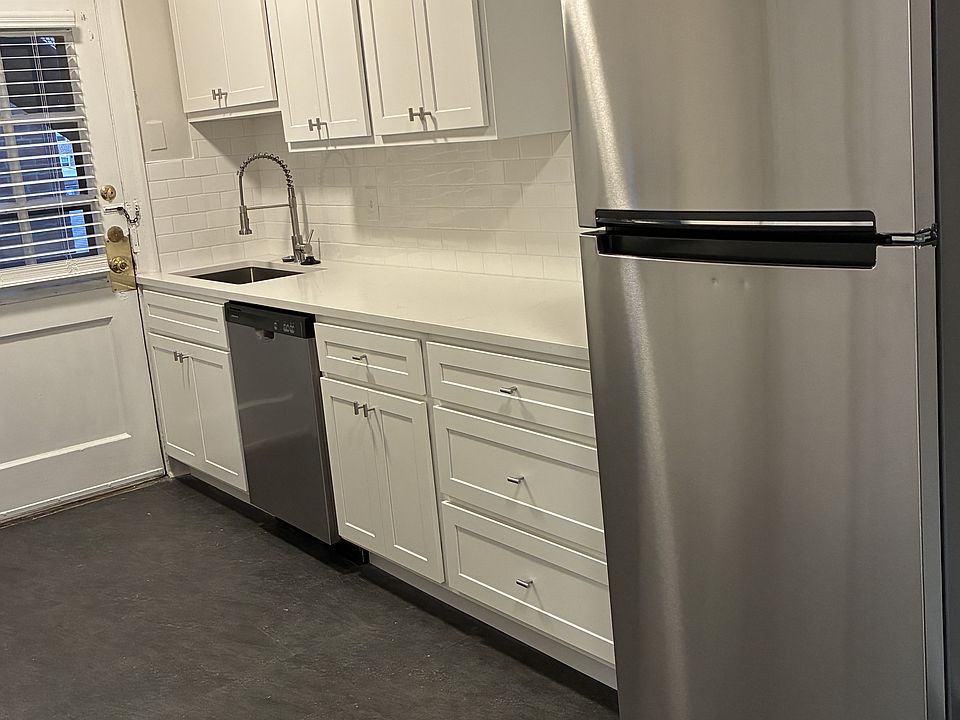 Remodeled kitchen with stainless steel appliances.
