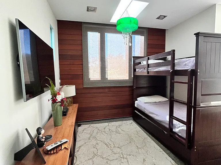 bedroom #2 with TV and bunk bed