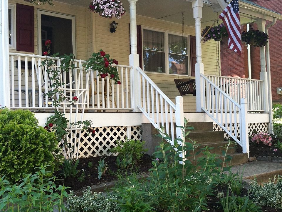 View of front porch and yard