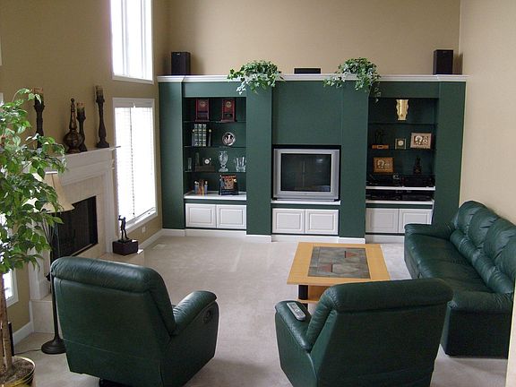 2-story family room with fireplace and built-ins.