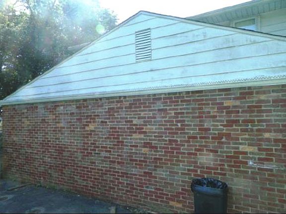 Deteriorating siding/garage