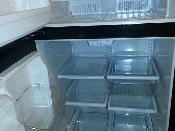 Spacious fridge included.