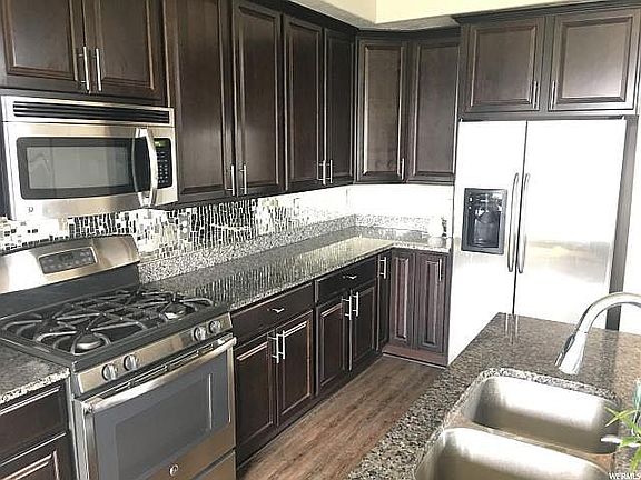 Custom mirrored backsplash