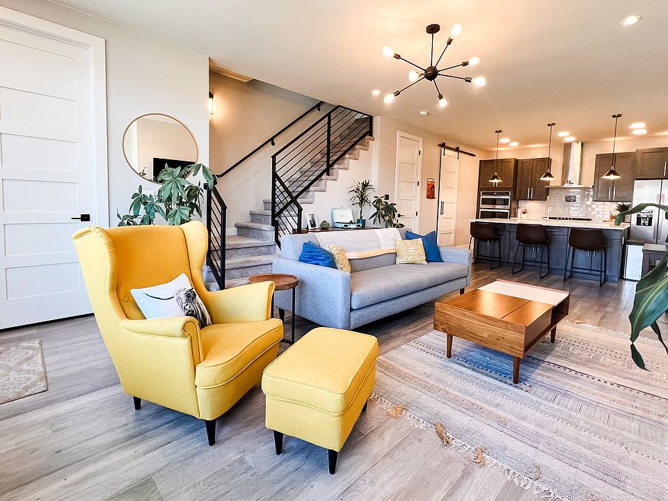 spacious first floor with open concept
includes living room, dining space, kitchen, large walk-in pantry, coat closet and powder bathroom