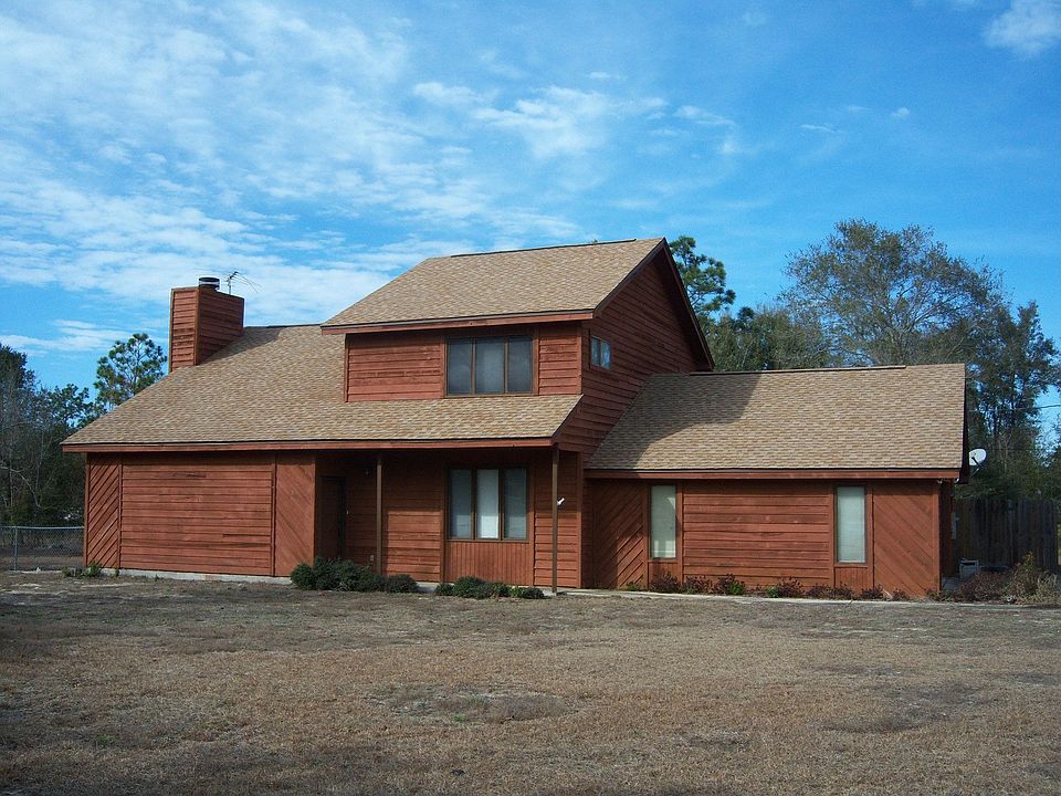 Split level on acre in secluded neighborhood                                  