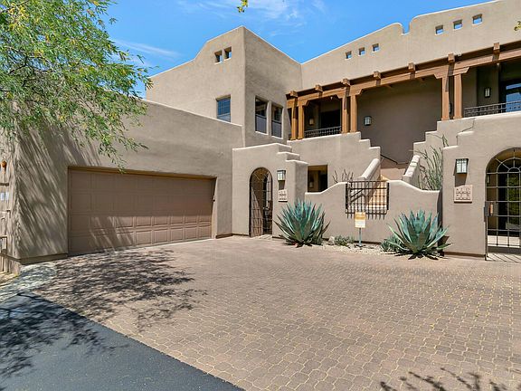 One shared parking slot in the garage. Plenty of guest parking steps away