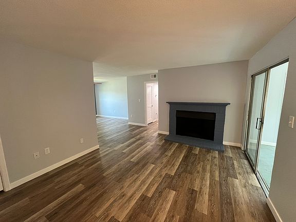 The living room with a fireplace.