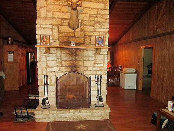 Double Fire Place Between Living & Dining. You are looking at the Living Rm. View