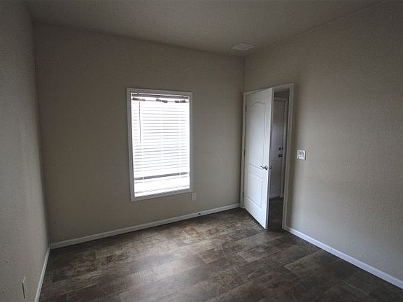 Master Bedroom Entry to Hallway Laundry Stack Closet