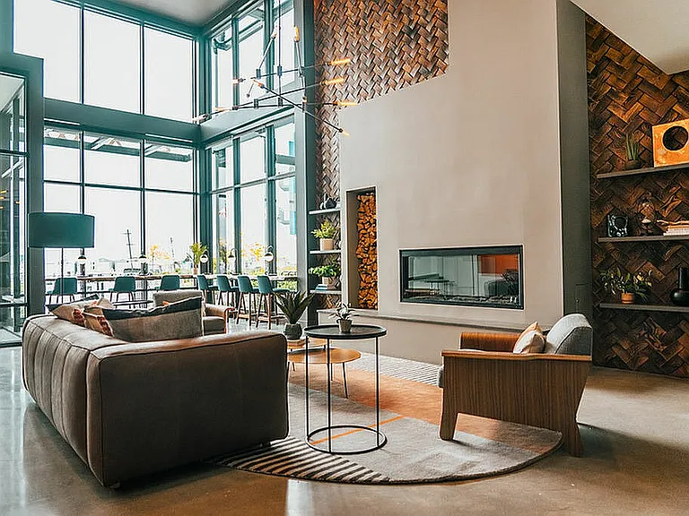 Explore the allure of this chic living space, featuring modern furnishings and abundant natural light.