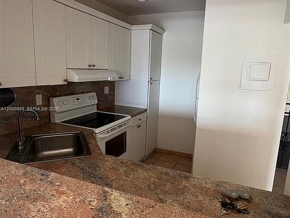 5th image of 6070 W 18th Ave APT 323