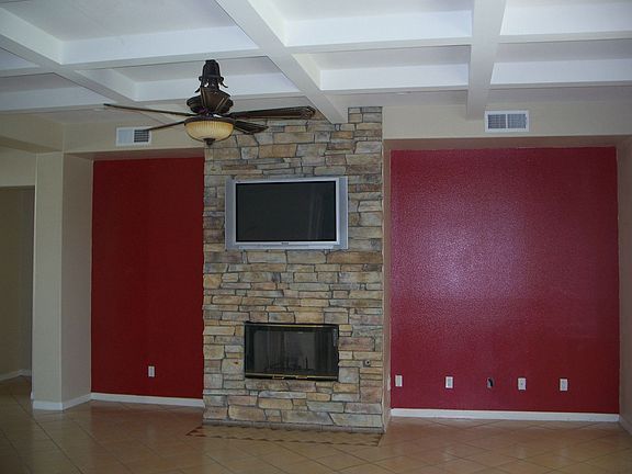 upgraded stone wall with fireplace