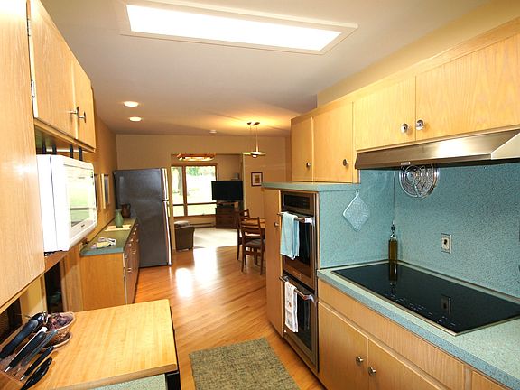 Kitchen showing Wolf Induction Cooktop and 1950's Mid-Century Modern Formica Counters