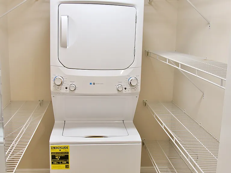 Spacious Walk-In Closet With "NEW" Full Size "High-End" Washer/Dryer Stack Unit.