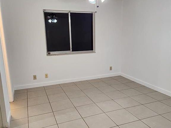 5th image of 511 Gardens Dr APT 104