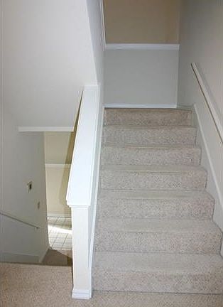 Stairs go up to the loft master bedroom and full bath.