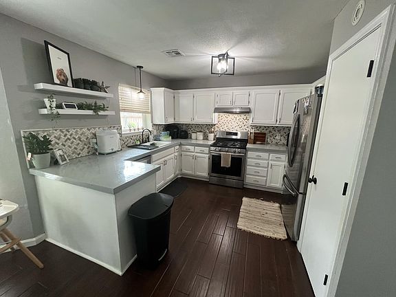 4th image of 8217 N 122nd East Ave