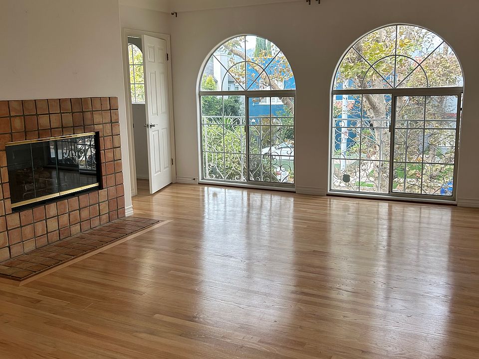 Living room with functioning fireplace