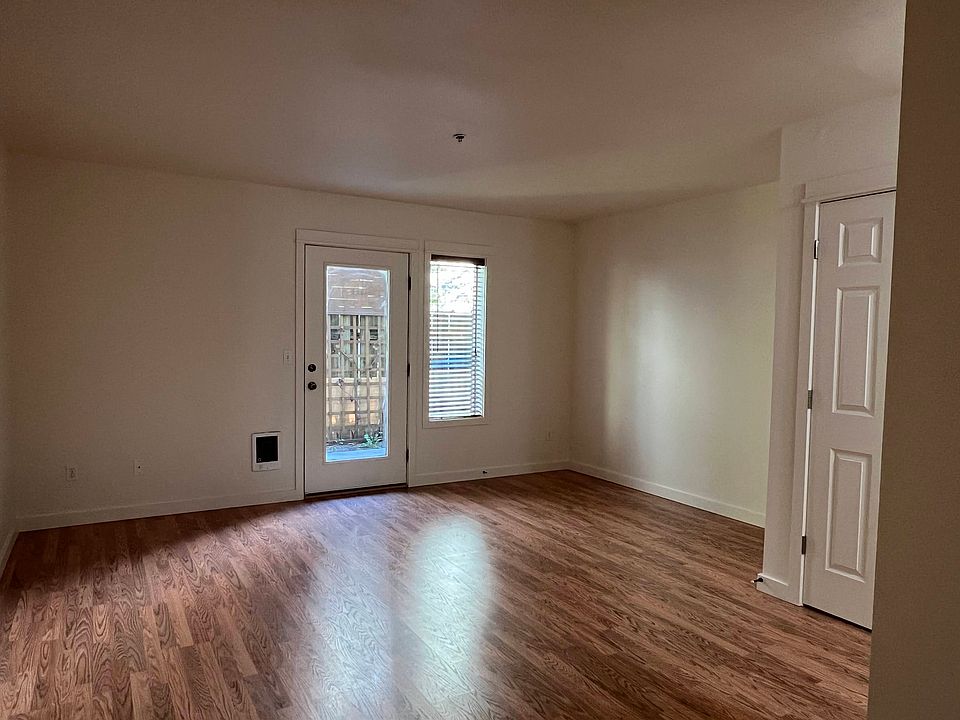 Living room with door to patio