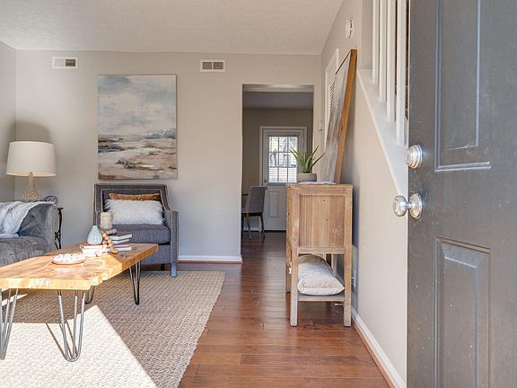 Living Room looking at Stairs and Kitchen