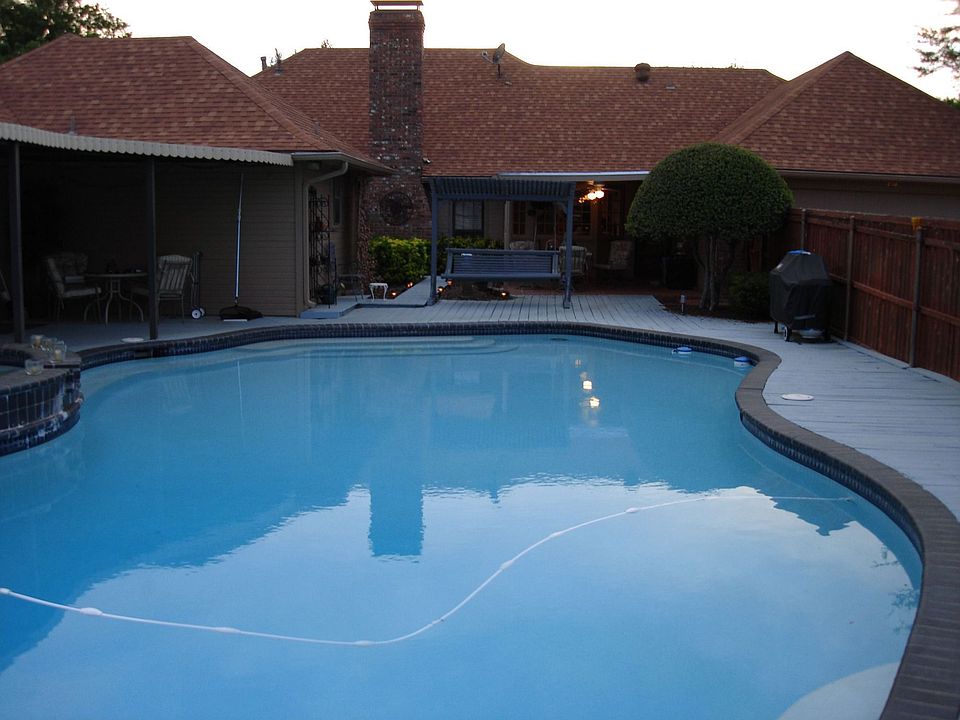 Pool facing back of house. Covered cabana incl 1/2 bath & music studio on left