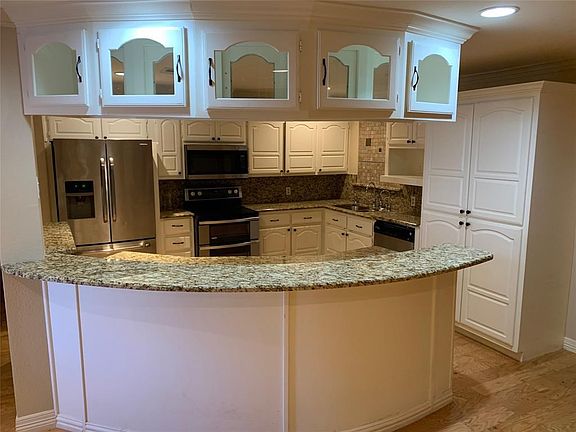 Stainless appliances with granite counter tops.