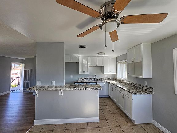 View of kitchen from Dining area
Dishwasher, Gas stove, Custom Cabinets and Granite Counters