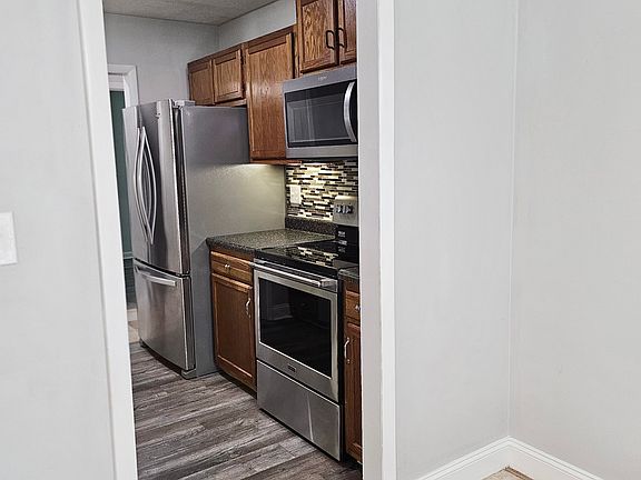 right side kitchen photo taken from dinning room area