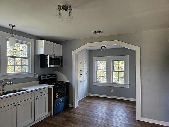 kitchen has new stove, microwave, dishwasher, and refridgerator